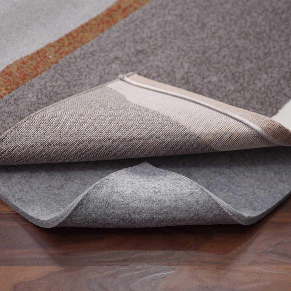 RESARE vue avant du pad 9x12 stabilise le tapis et protège le sol