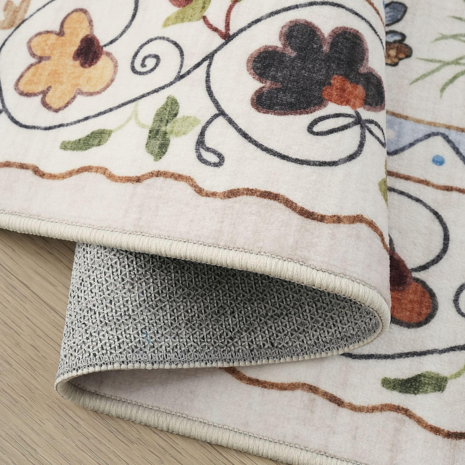 Coin enfant avec tapis Rugcomf montrant durabilité et facilité nettoyage
