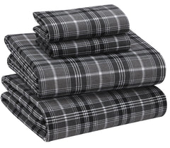 RUVANTI drap housse face montrant ajustement et maintien durable