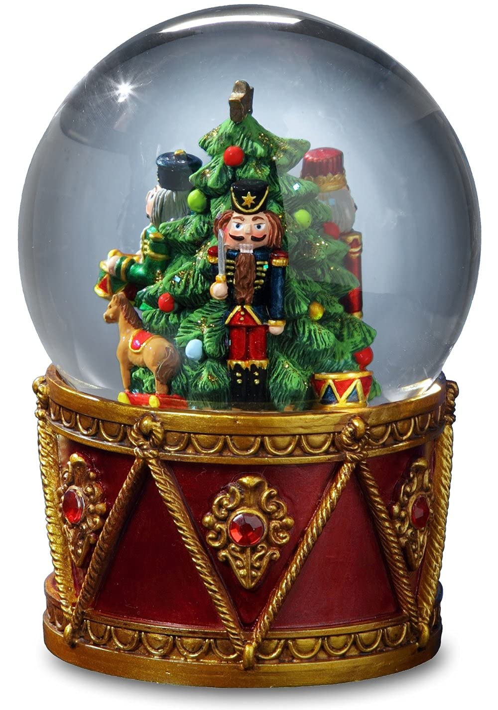 The San Francisco Music Box Company globe en situation sur manteau, ambiance festive