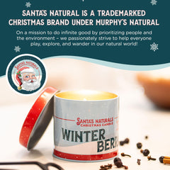 Santa's Naturals bougie allumée sur manteau créant atmosphère chaleureuse