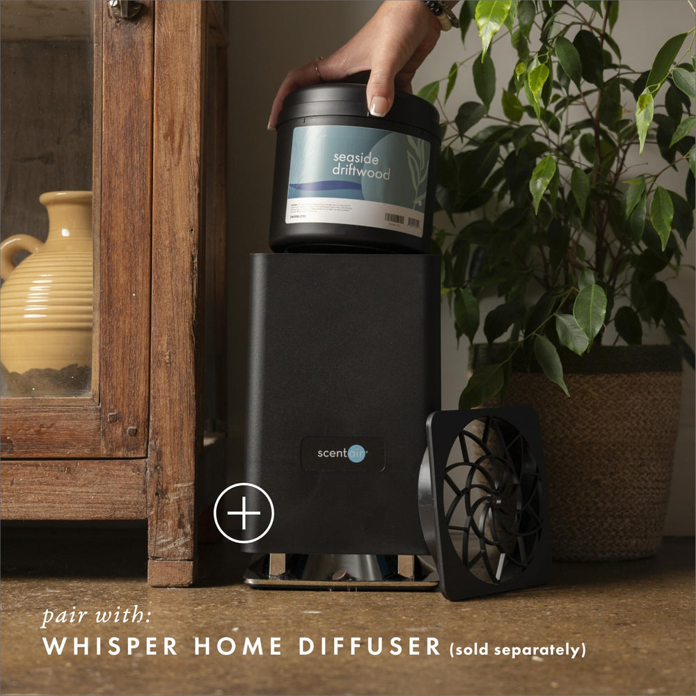 ScentAir cartouche insérée dans diffuseur Whisper Essential, assure diffusion continue