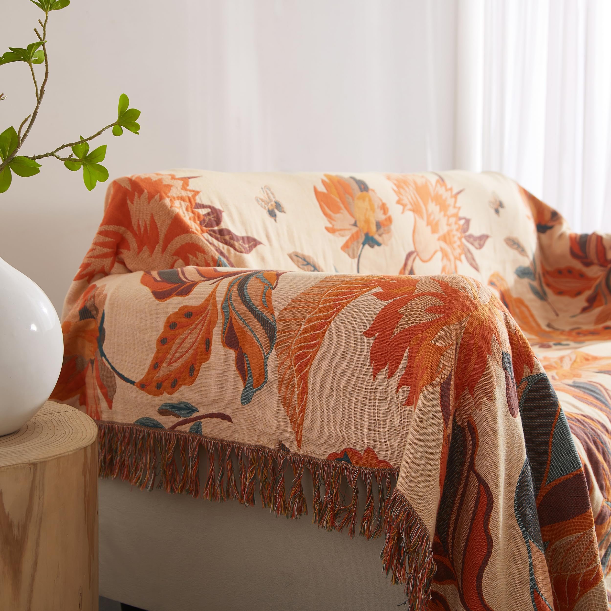 SE SOFTEXLY plaid étalé sur lit ajoutant une touche farmhouse élégante
