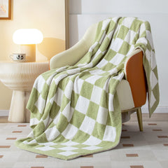 SeaRoomy plaid vert face avant, apporte style et confort au canapé