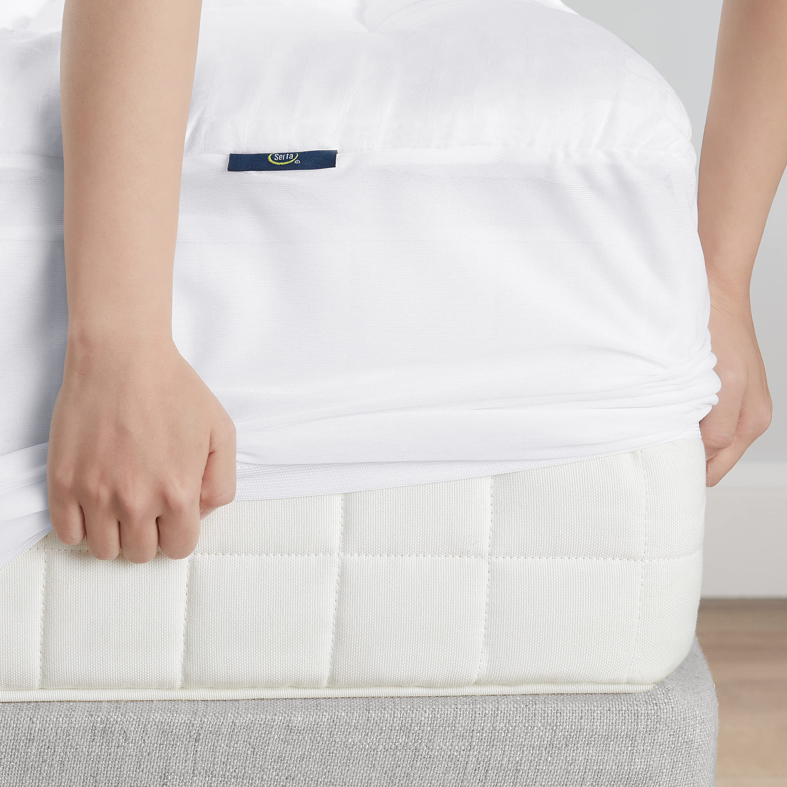 Serta coupe transversale montrant couches et support amélioré