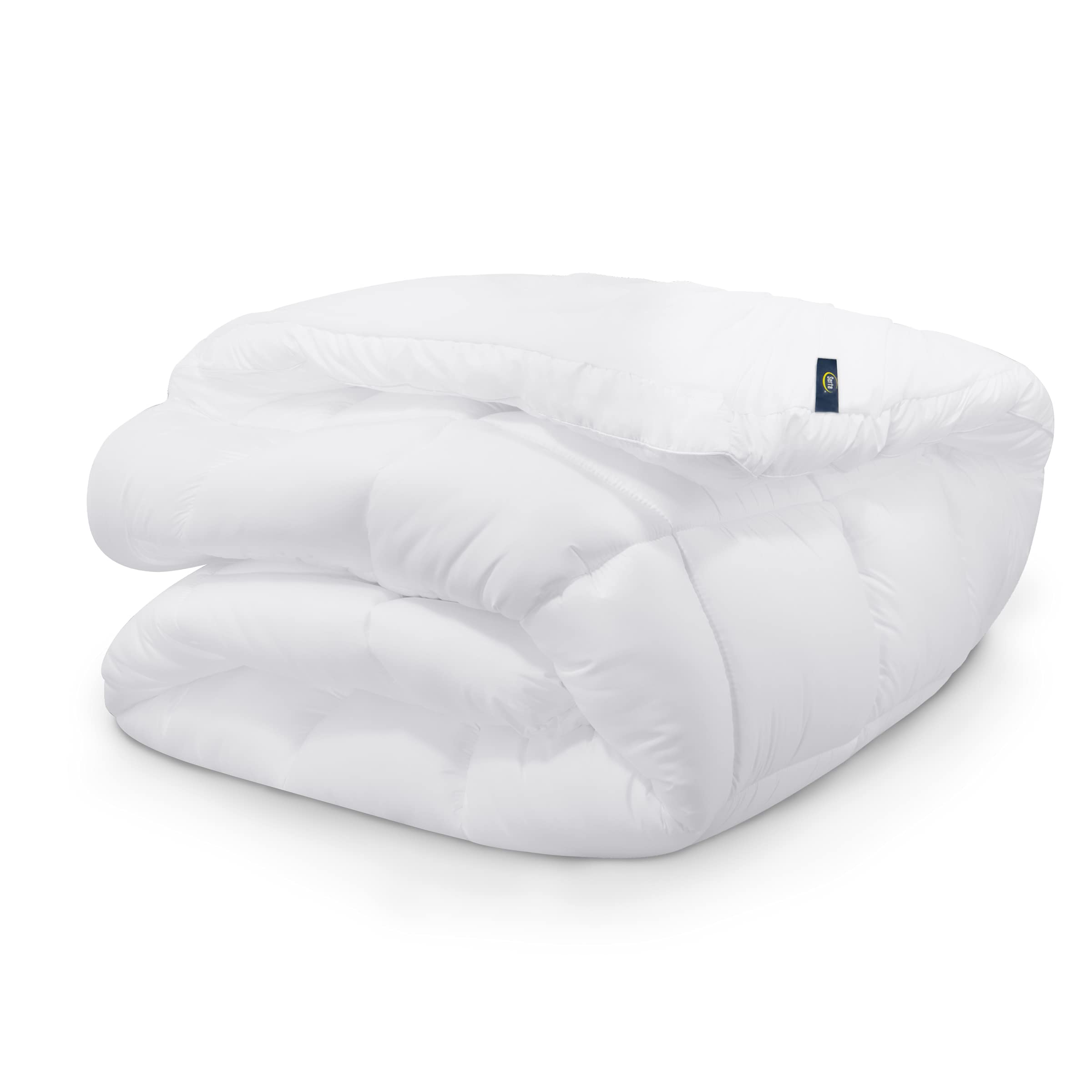 Serta surmatelas présenté dans une chambre améliore confort et esthétique