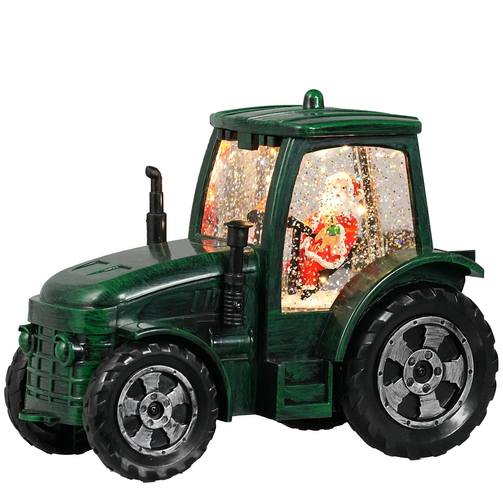 Seschrist boule à neige face montrant tracteur vert et Père Noël pour décor festif