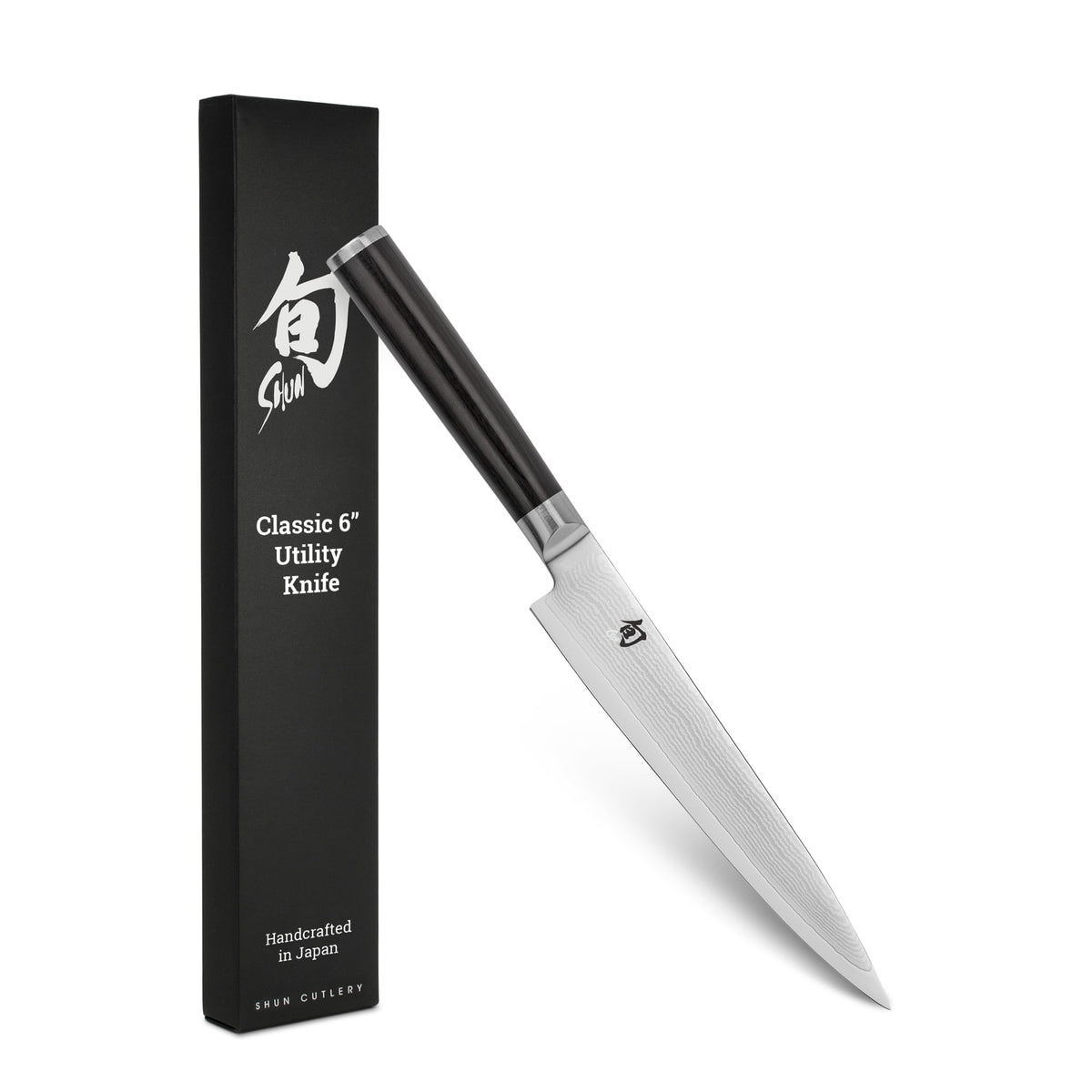 Shun couteau utilitaire face avant montrant la lame damas et design durable
