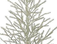 Silk Decor sapin tinsel sur table illustrant ambiance festive et gain d'espace décoratif