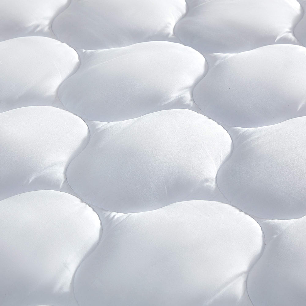 SLEEP ZONE coupe transversale montrant épaisseur du surmatelas et distribution uniforme du poids