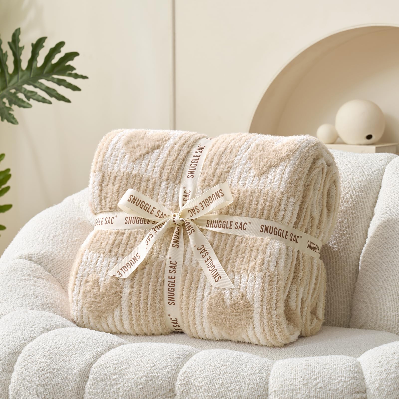 Snuggle Sac détail motif cœur carreaux ajoutant intérêt décoratif