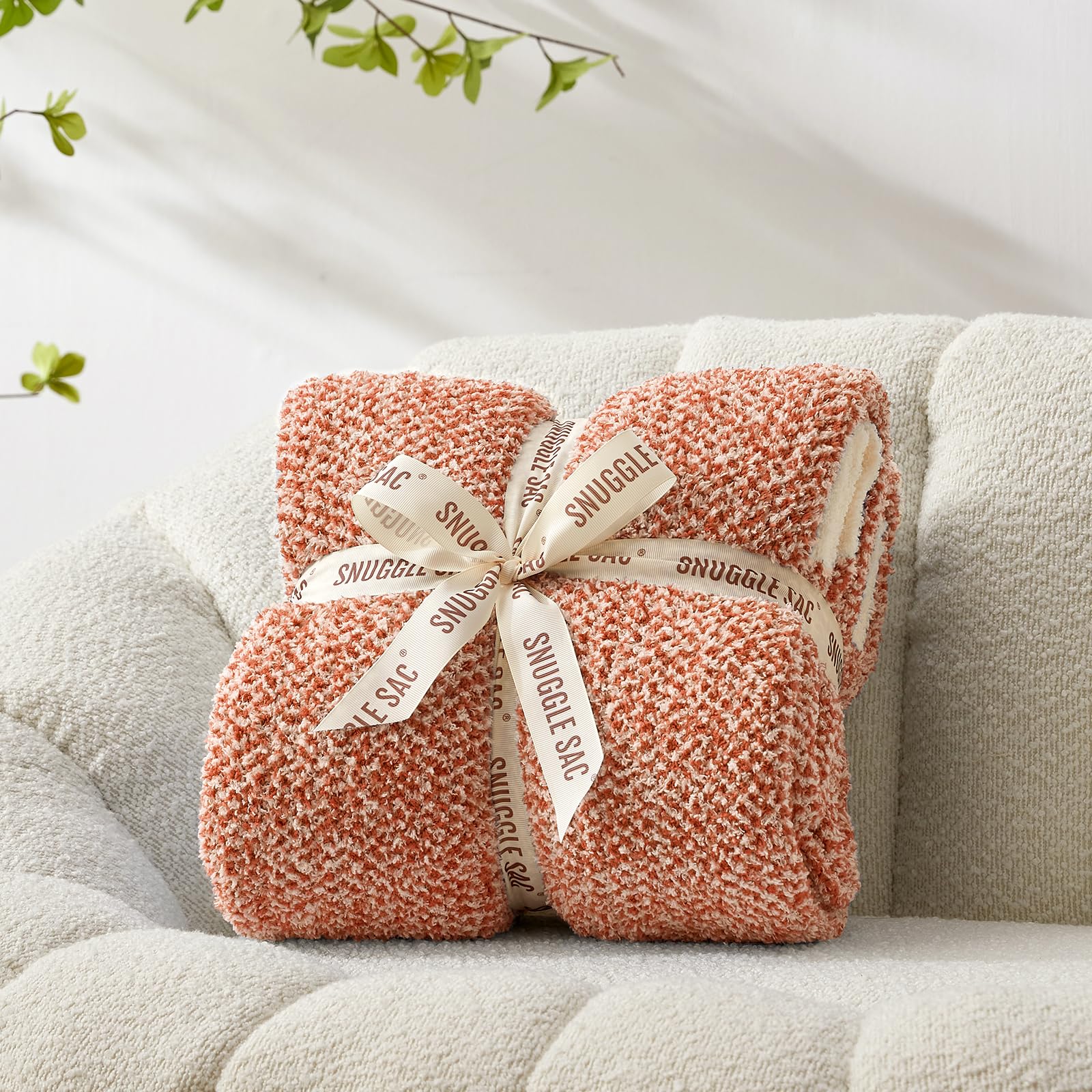 Détail réversible Snuggle Sac montrant motif heather et polyvalence