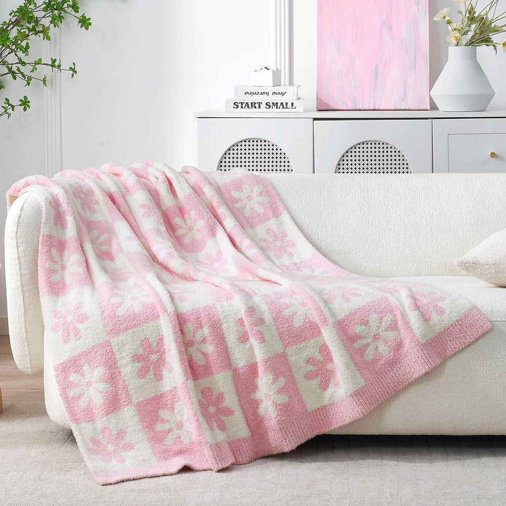 Snuggle Sac couverture réversible exposant les deux faces et polyvalence décorative