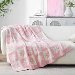 Snuggle Sac couverture réversible exposant les deux faces et polyvalence décorative