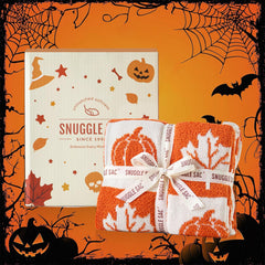 Snuggle Sac plaid drapé sur canapé pour ambiance automnale confortable