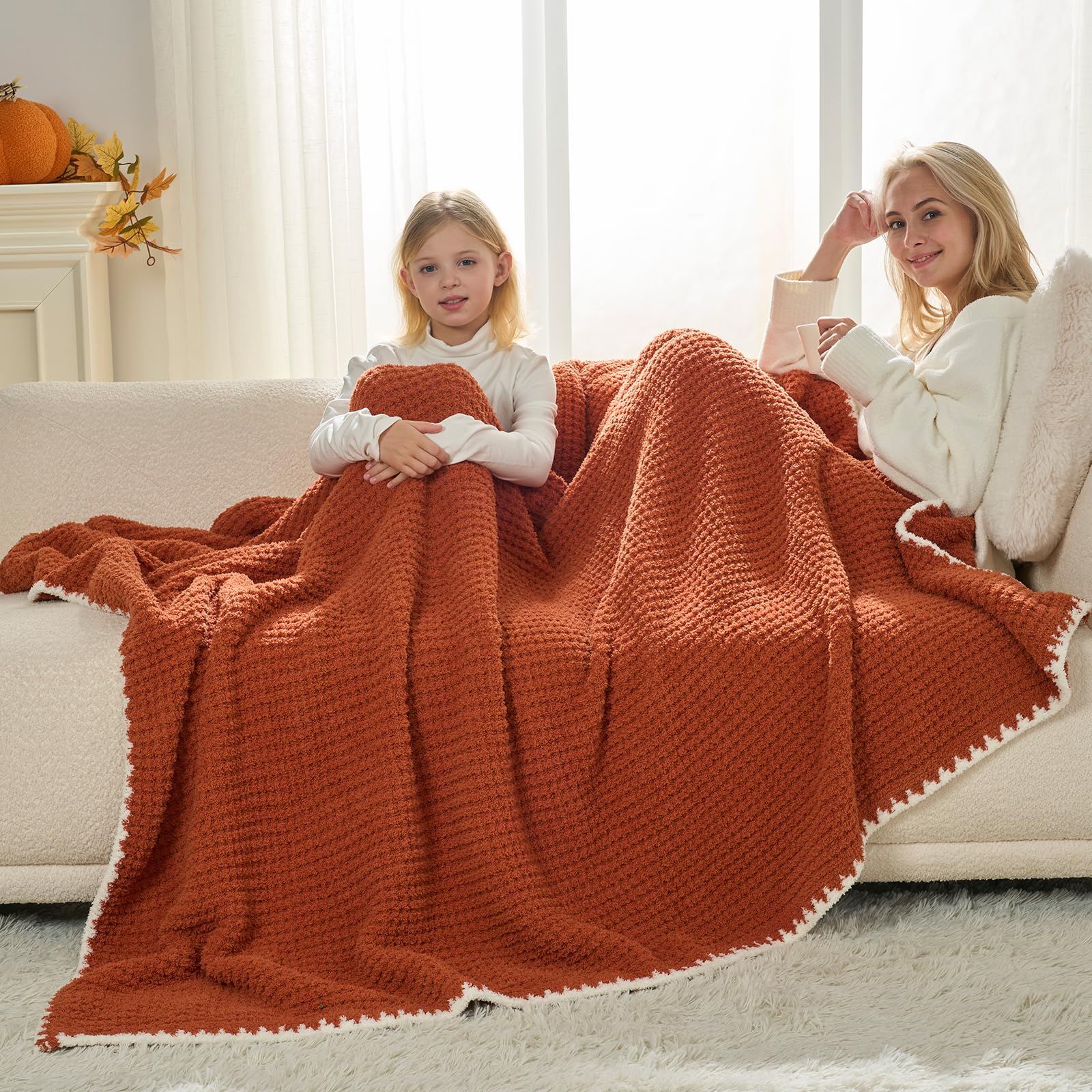 Snuggle Sac plaid à côté d’une règle montrant taille 50x60 pratique