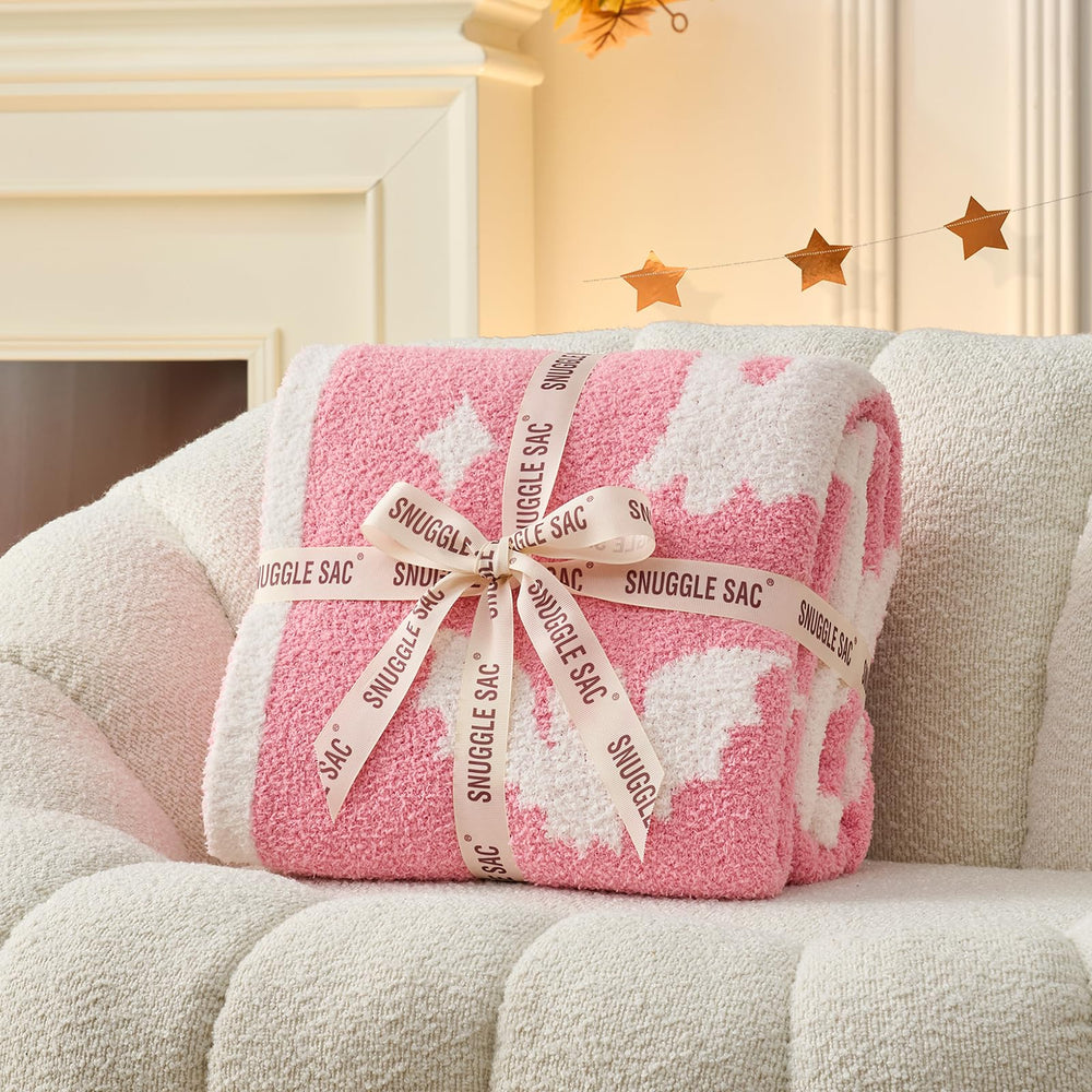 Comparaison taille Snuggle Sac 50x60 pouces sur fauteuil, visuel d’échelle pratique