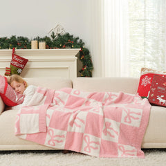 Snuggle Sac posé sur canapé, apporte chaleur et style au salon