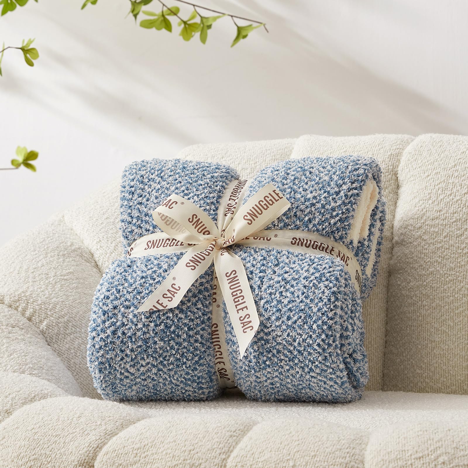 Comparaison d'échelle Snuggle Sac 50x70 pouces illustre couverture généreuse