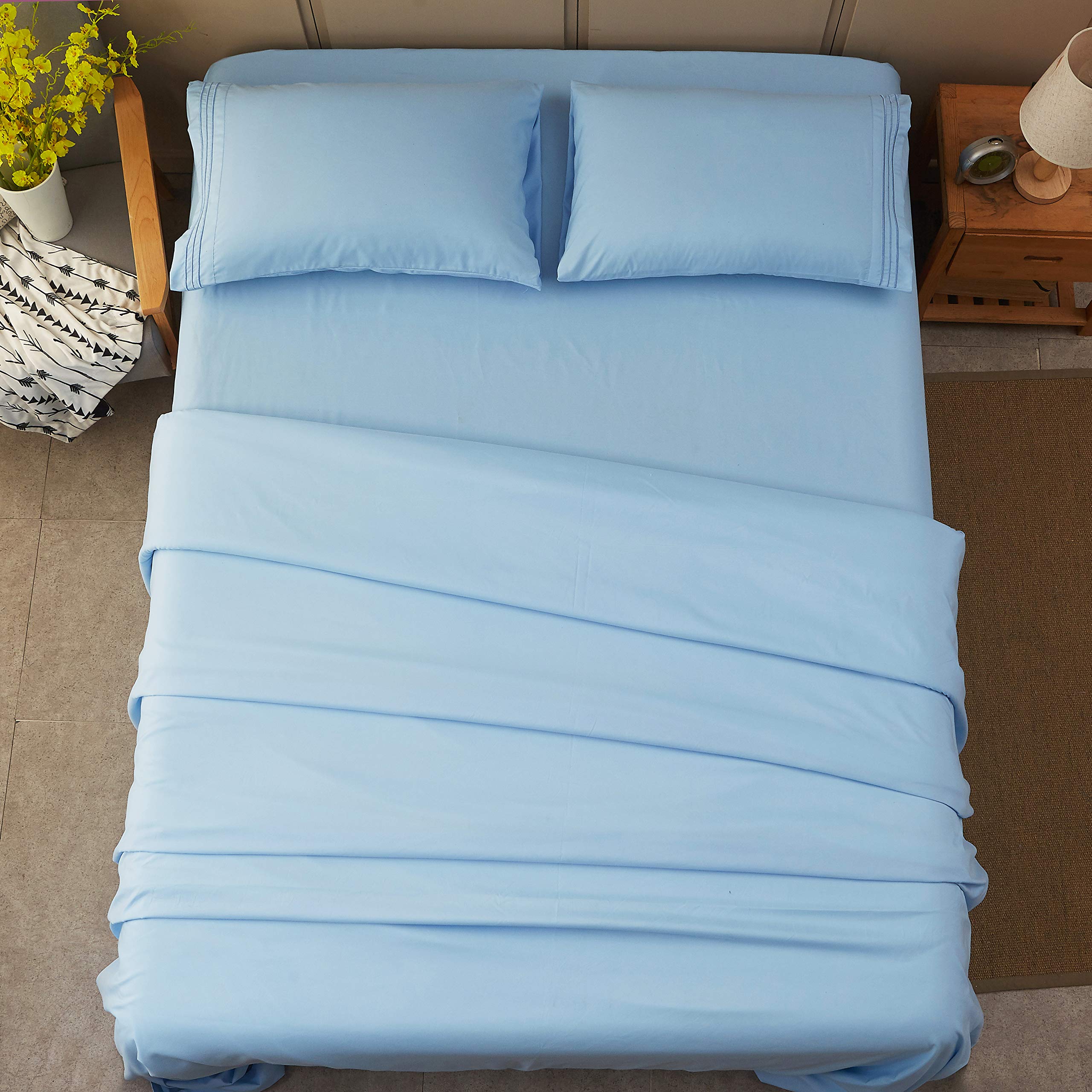 SONORO KATE couple se couchant pour illustrer confort, maintien et aspect hypoallergénique