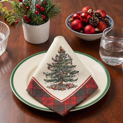 Spode détail houx et baies sur tissu apportant charme traditionnel aux repas