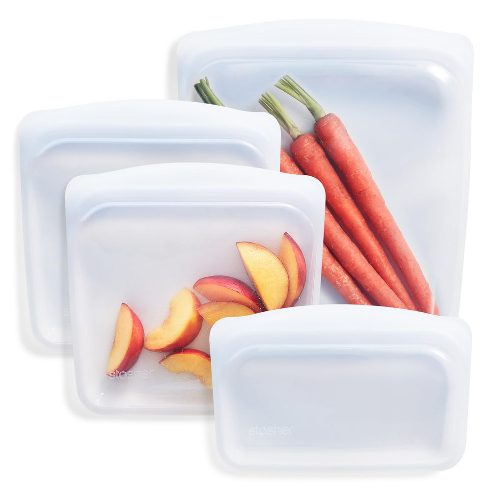 Stasher emballage avant transparent montrant le pack 4 sacs, durable et réutilisable