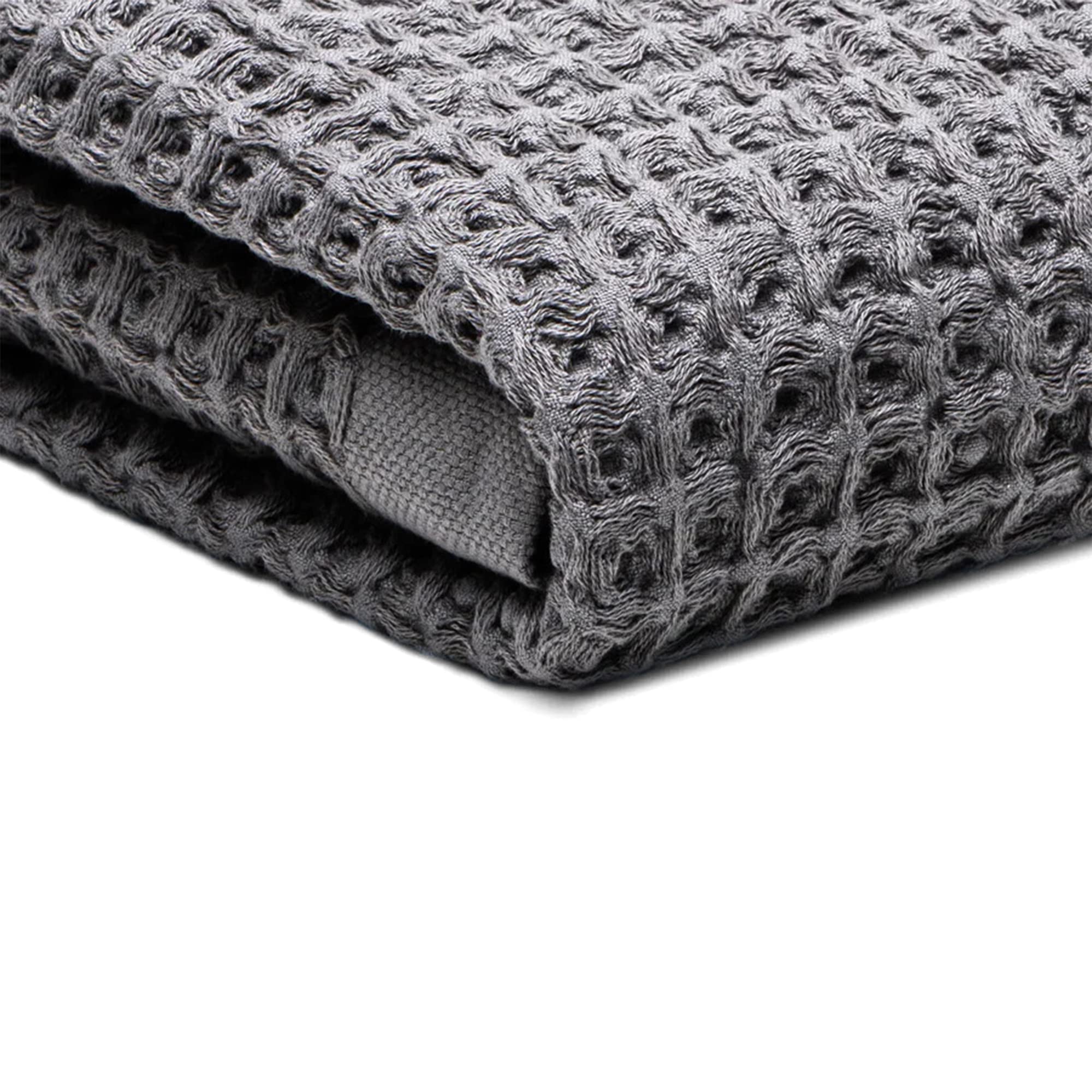 SUTERA serviette face gaufrée gris montrant absorption rapide