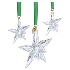 Swarovski trio d'étoiles en décor de Noël apportant touche festive raffinée
