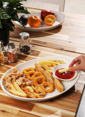 Sweese plat ovale en usage sur table dressée, facilite le service
