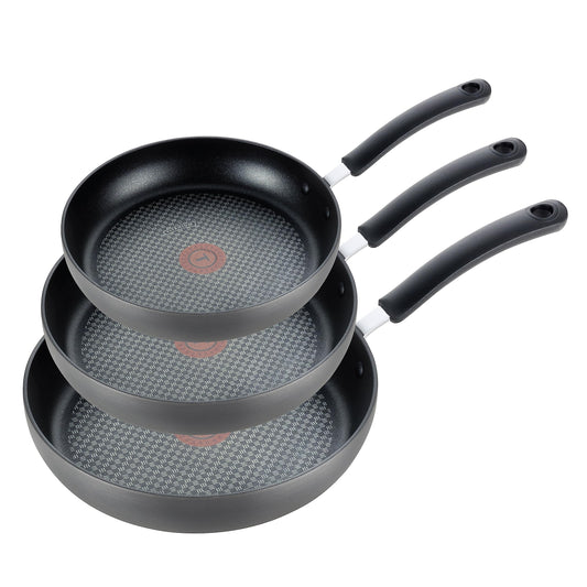 T-Fal ensemble de trois poêles Onyx montrant l'ensemble des tailles et la finition, utile pour choisir la bonne poêle