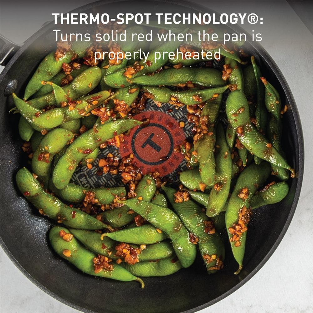 Indicateur Thermo-Spot T-Fal montrant le cercle rouge, aide à préchauffer pour saisir parfaitement