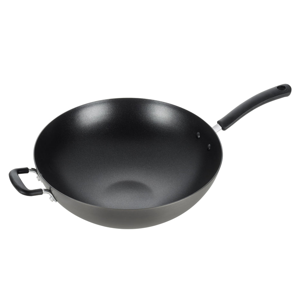 T-Fal wok vue de face emballage montrant design et dimensions, indique fiabilité