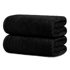Tens Towels serviette pliée en noir montrant finition nette et rangement compact