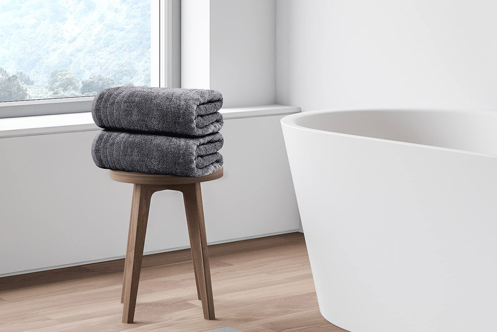 Tens Towels personne s'enroulant pour montrer absorption rapide