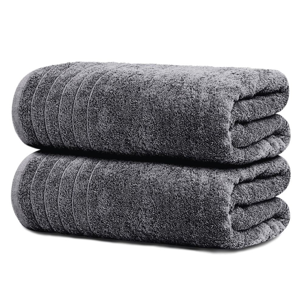 Tens Towels drap de bain plié gris foncé montrant finition et gain de place