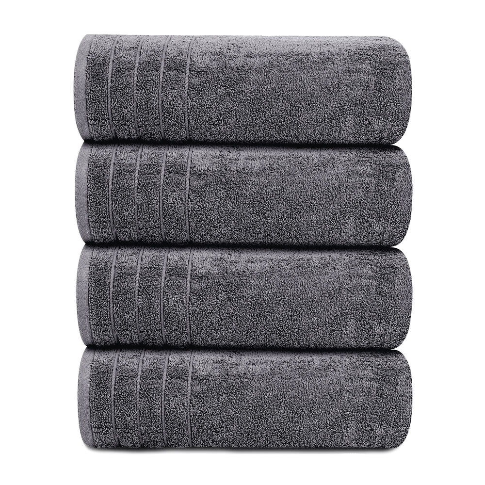 Tens Towels posées sur carrelage de salle de bain pour style