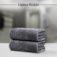 Tens Towels enveloppant une personne après la douche pour confort rapide