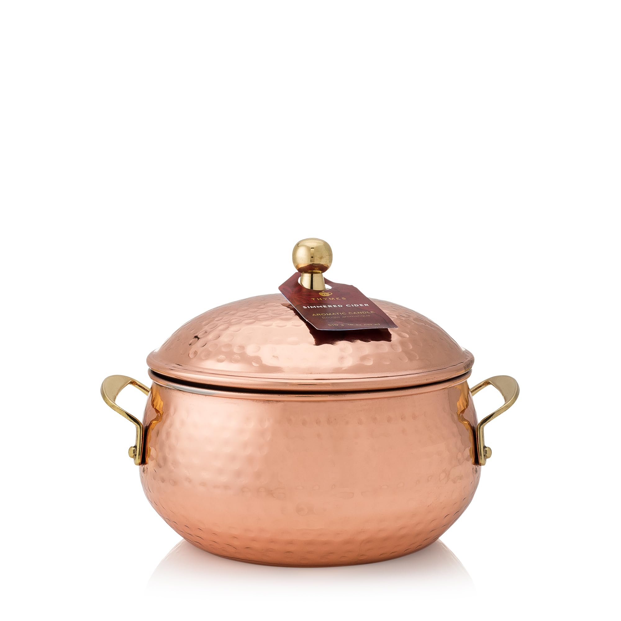 Thymes pot cuivré face montrant design luxueux et atmosphère chaleureuse