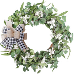 TIVMIK couronne eucalyptus sur porte d'entrée créant une première impression accueillante