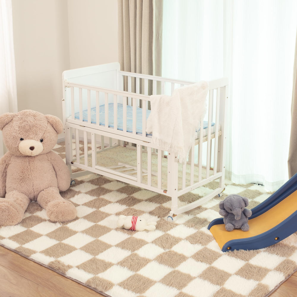 TOOHUB enfant jouant sur le tapis, confortable et adapté aux familles