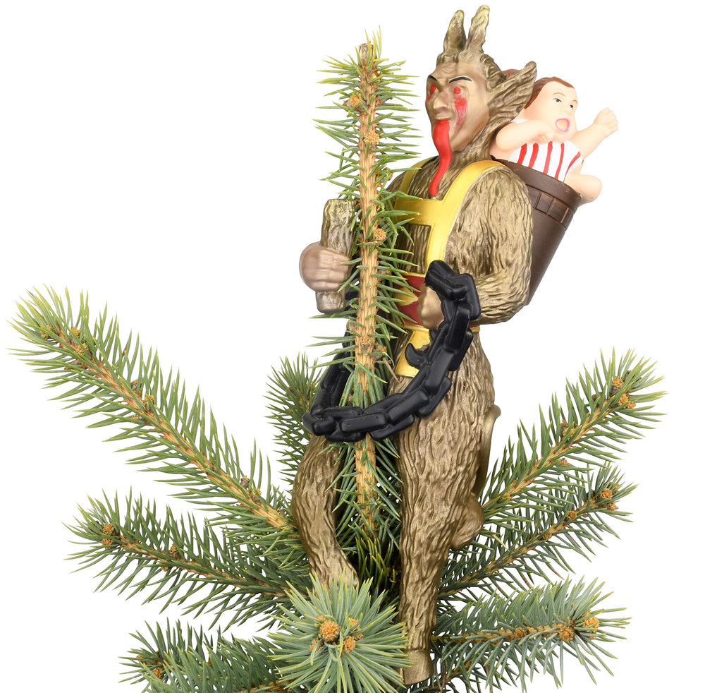 Tree Buddees Krampus posé sur sapin artificiel illustrant stabilité et style bénéfique
