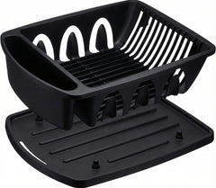 Tribello porte-couverts rempli montrant organisation et drainage efficace