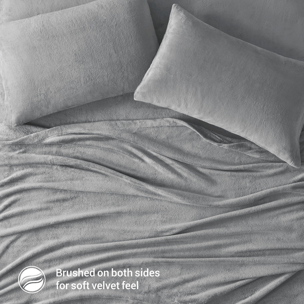 Drap‑housse True North élastique illustrant maintien sûr sur matelas