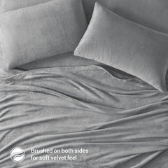 Drap‑housse True North élastique illustrant maintien sûr sur matelas