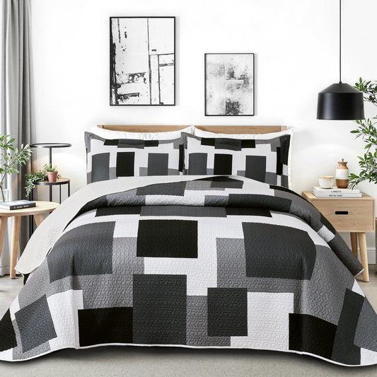 Tyrot face de la couette noir gris montrant style patchwork et élégance