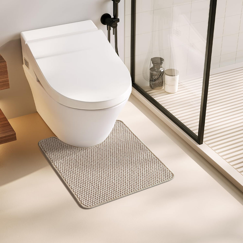 TYUU tapis WC vue frontale beige, finition lisse pour confort immédiat