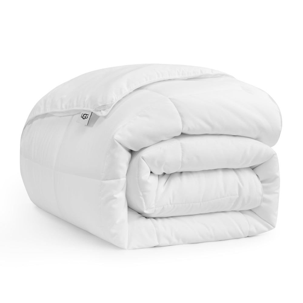 UGG couette Danielle face avant avec emballage montrant finition et couleur blanche