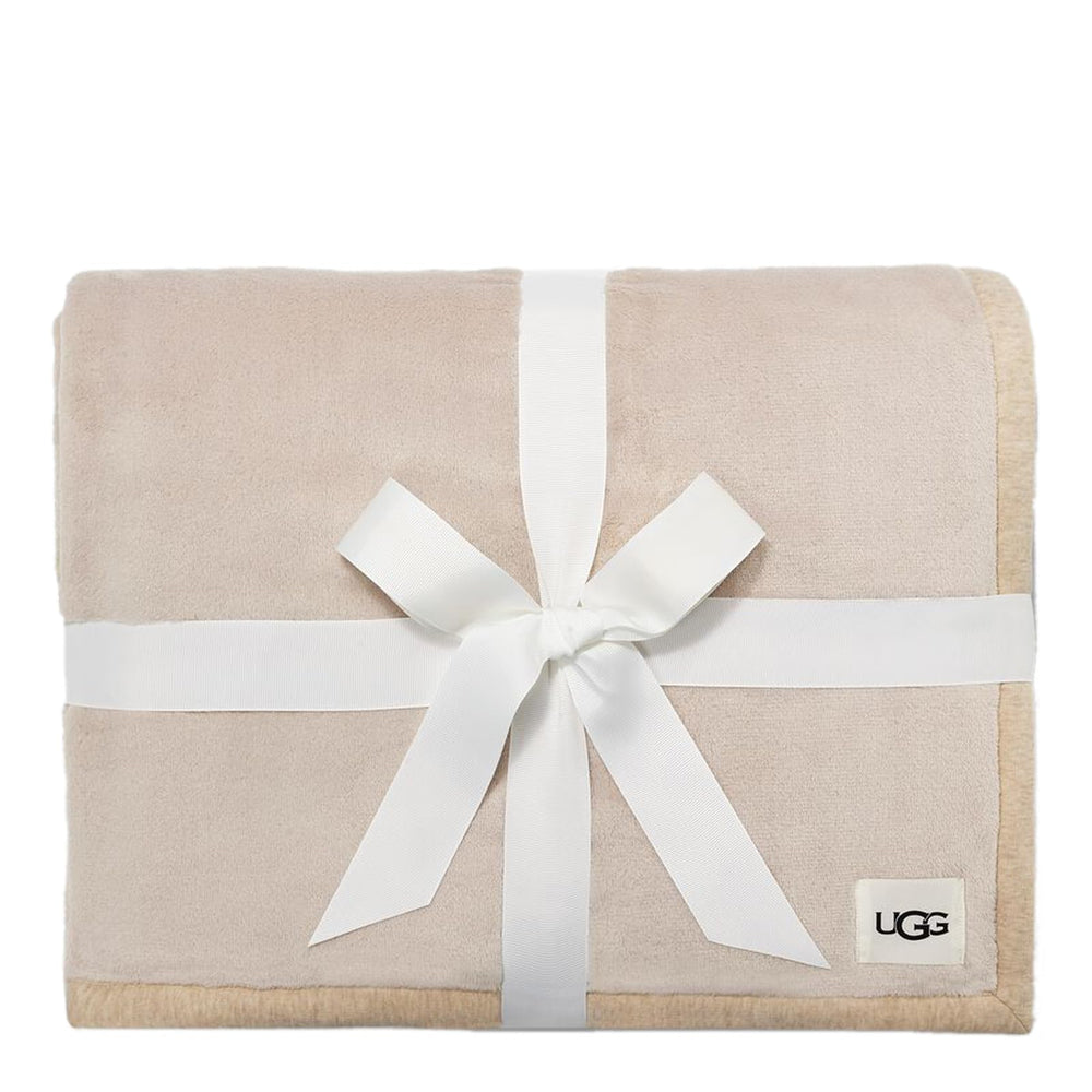 Gros plan texture UGG Duffield montrant douceur veloutée, bénéfice chaleur tactile
