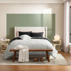 UGG coussin décoratif zoom apportant finition élégante au lit