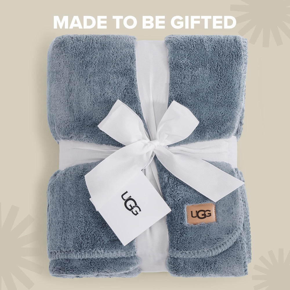 UGG Whitecap personne blottie prouvant chaleur légère
